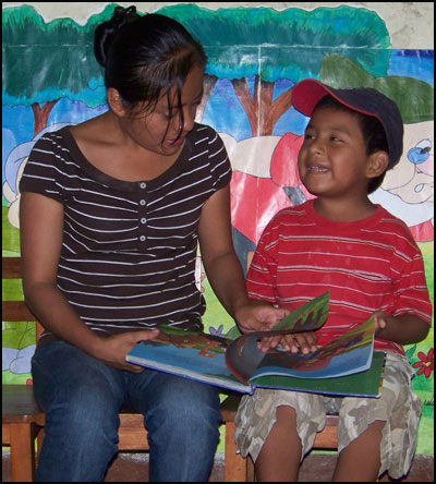 Adult and child reading